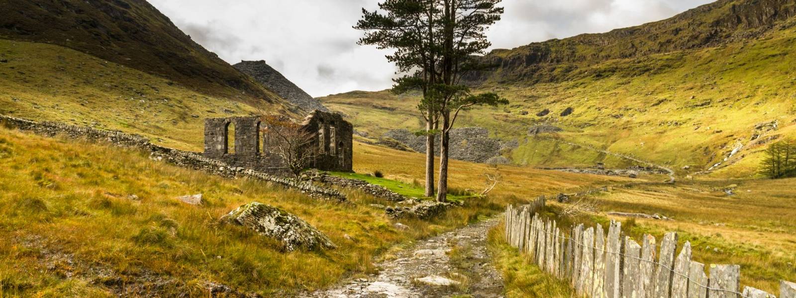 View towards slate minerâs Rhosydd chapel in hanging valley cwmorthin. Bleneau Ffestiniog, Snowdonia, North Wales.