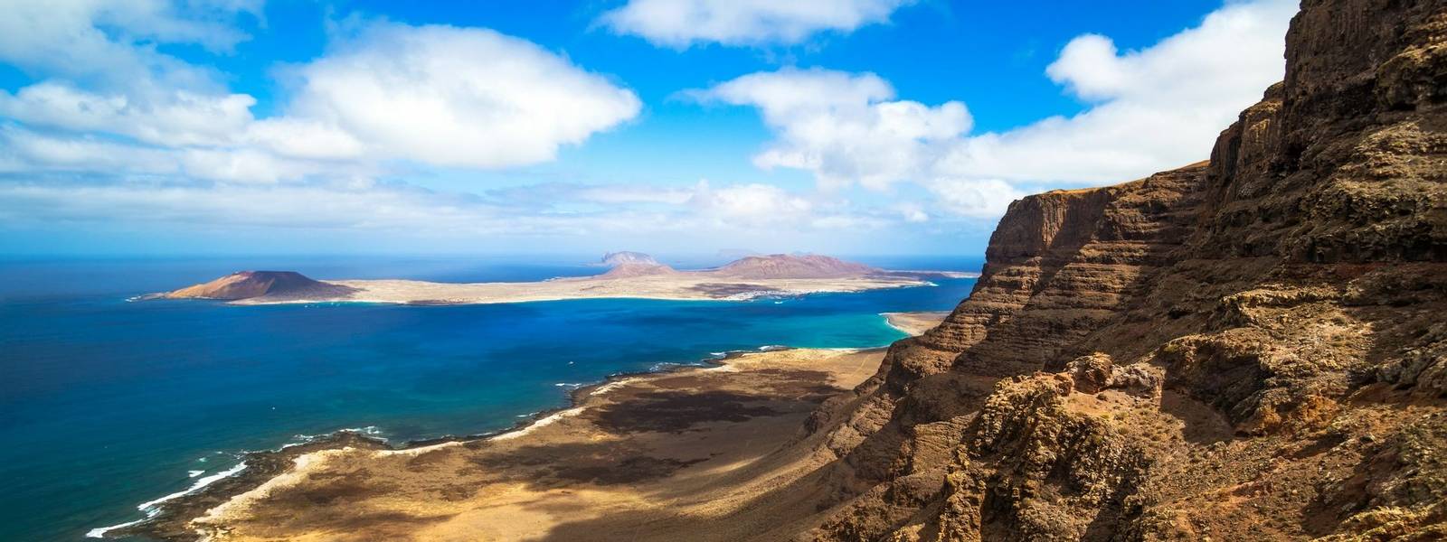Panorama of the island of La Graciosa, northern of lanzarote, seen from Mirador de Guinate. Canary Islands, Spain.