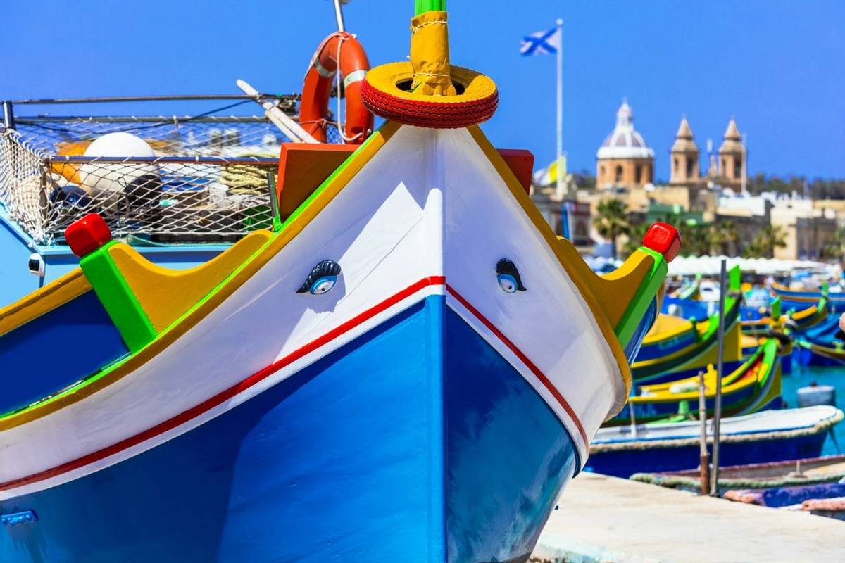 traditional colorful fishing boats luzzu un Malta