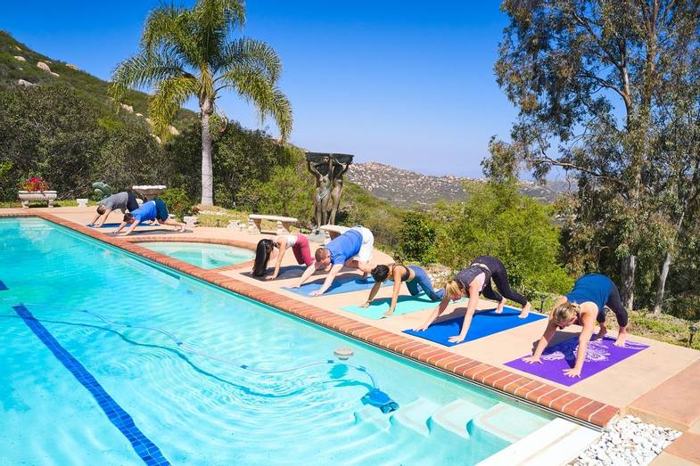 SoCal Wellness Retreats_yoga poolside.jpg