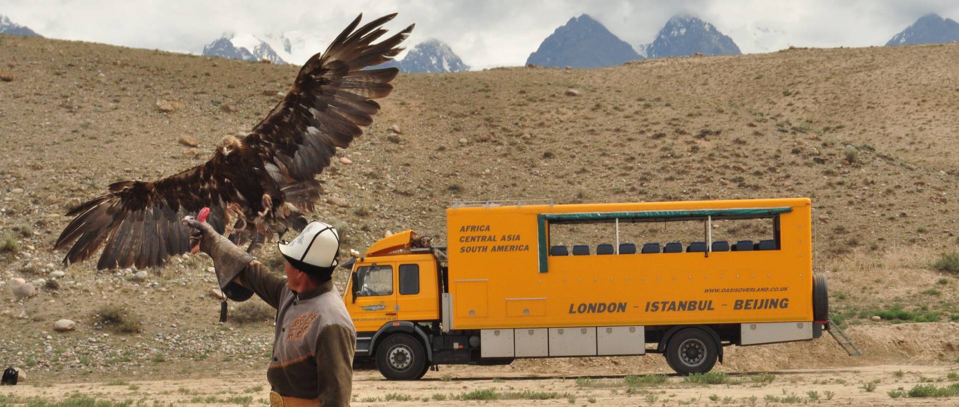 Hunting Display With An Eagle and Oasis truck, Kyrgyzstan