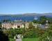 Bantry House in Ireland with sailboat in behind