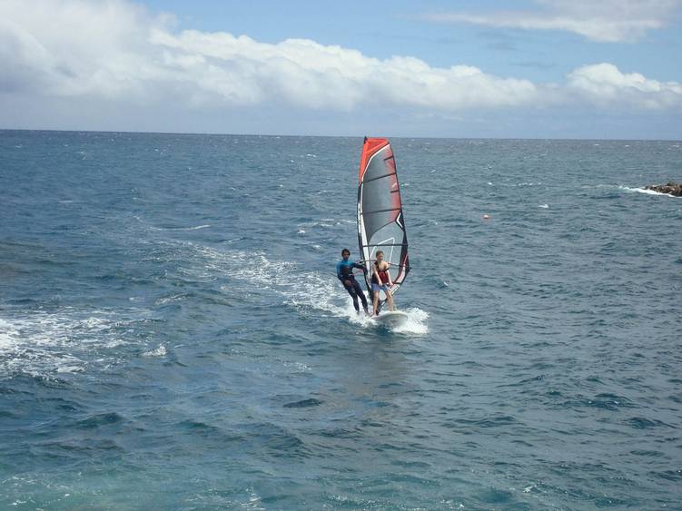 Windsurfing off the coast at Galo Resort