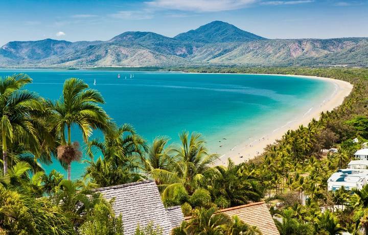 Port Douglas beach and ocean on sunny day, Queensland, Australia Port Douglas beach and ocean on sunny day, Queensland, Australia