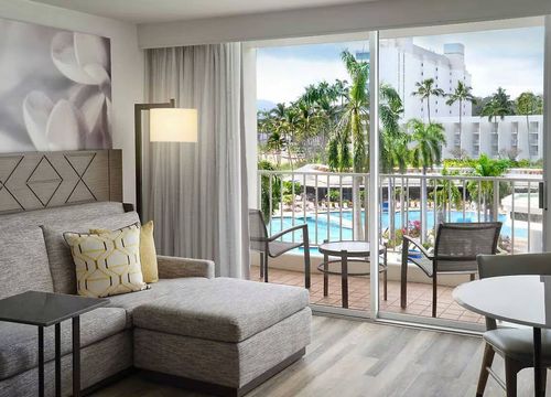 The Royal Sonesta Kauai Resort guestroom living area.jpg