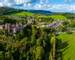 Aerial view of Dunster Castle in the village of Dunster, Somerset, England