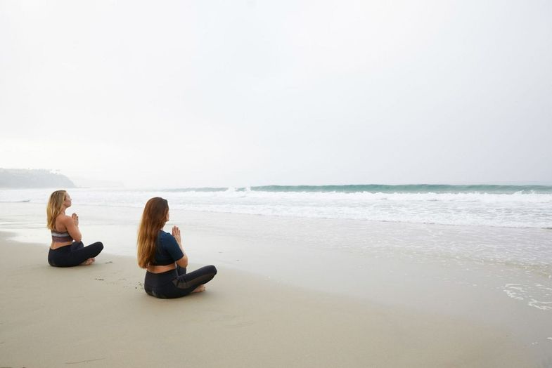 Waldorf Astoria Monarch Beach yoga on beach.jpg