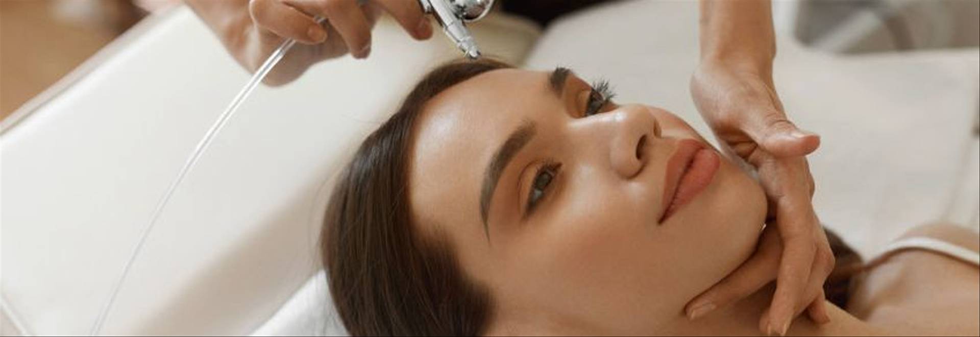 61052317 - facial beauty treatment. closeup of beautiful woman getting oxygen epidermal peeling at cosmetic beauty spa salon…