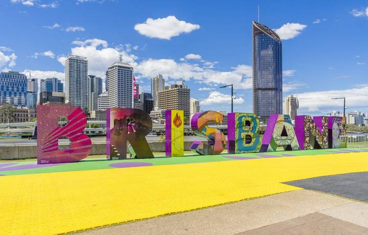 Brisbane, Australia - September 25, 2016: View of Brisbane sign with skyscrapers in the background in South Bank, Brisbane d… Brisbane, Australia - September 25, 2016: View of Brisbane sign with skyscrapers in the background in South Bank, Brisbane d…