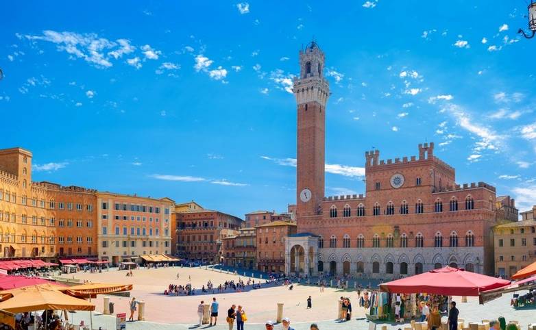 Italy, Siena. July 27, 2018 - Panorama of Piazza del Campo with Mangia Tover, Tuscany