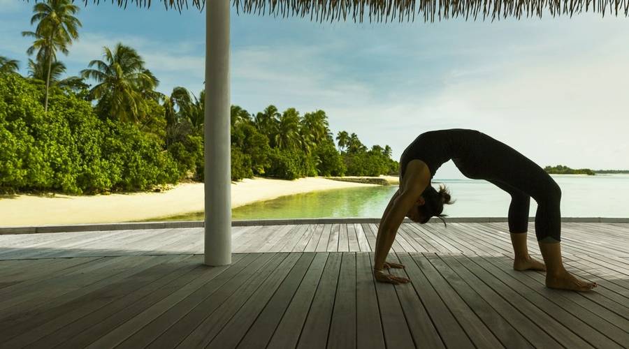 Island yoga at COMO Maalifushi