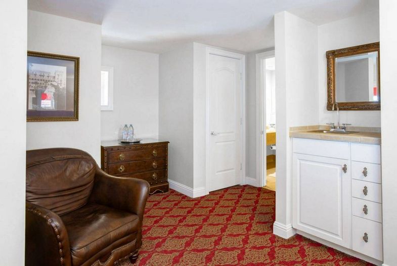 Casa Monica Resort & Spa, Autograph Collection suite seating area.jpg