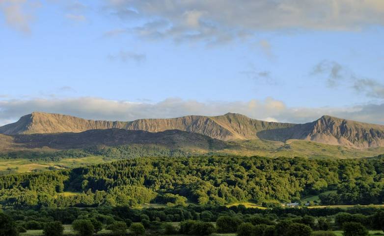 An evening view looking South to the Cadair Idris range. Gwynedd, North Wales