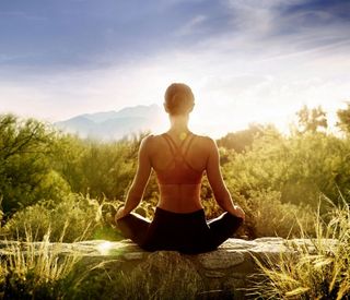 canyon-ranch-tucson-activities-female-yoga-sunrise.jpg