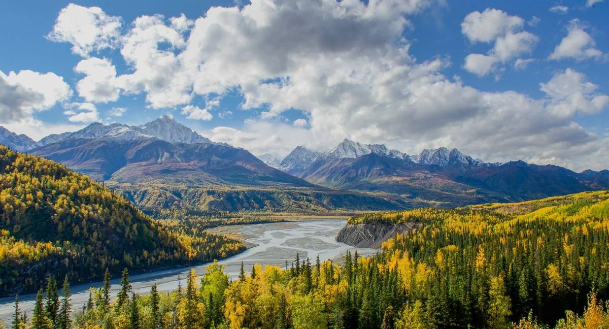 The Matanuska River flows below the Chugach Mountains in Alaska