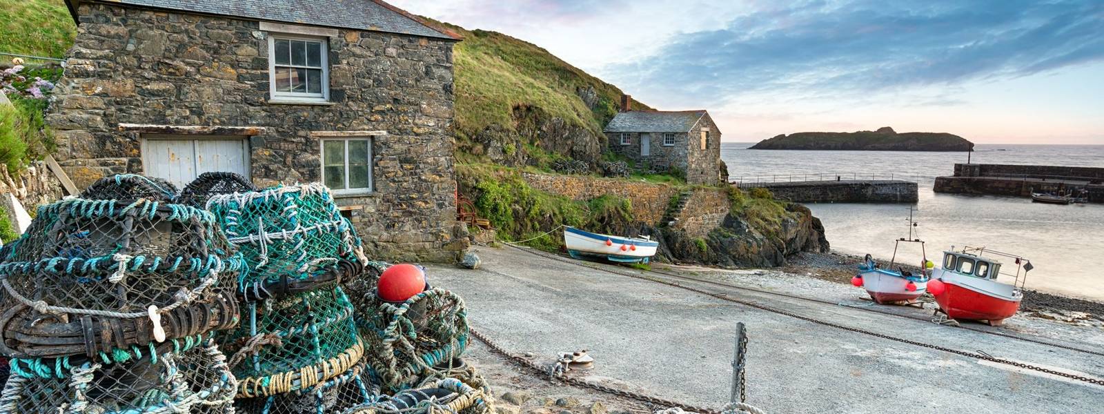 Sunset at Mullion Cove, a small fishing village on the Lizard Peninsula on the Cornwall coast