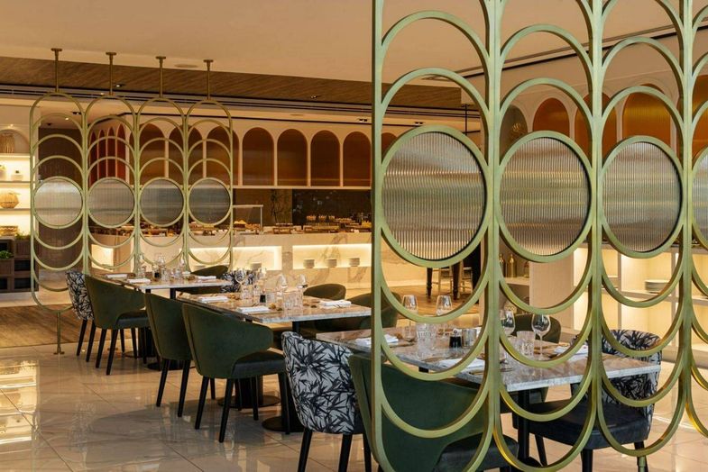 Westin Mina Seyahi Beach Resort inside tables.jpg