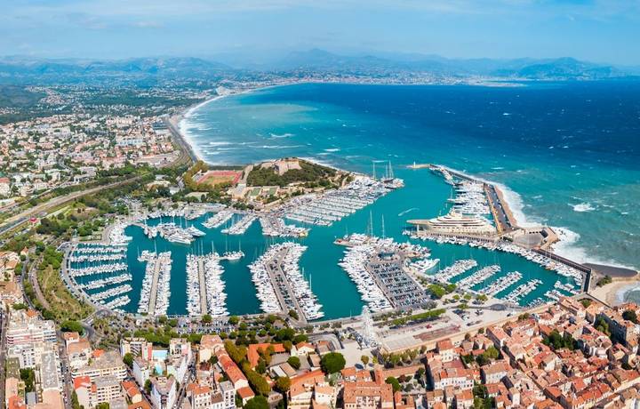 Antibes port aerial panoramic view. Antibes is a city located on the French Riviera or Cote d'Azur in France. Antibes port aerial panoramic view. Antibes is a city located on the French Riviera or Cote d'Azur in France.