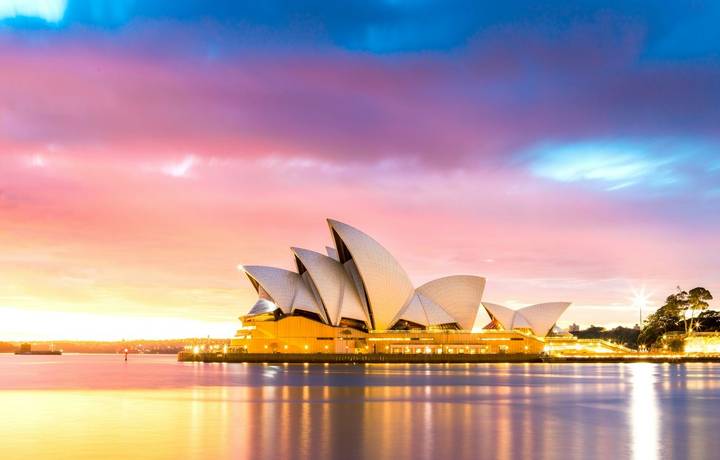 Sydney, Australia - Melbourne 25, 2018: Sydney Opera House view with the light on at dawn.