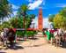 Marrakesh, Morocco: Beautiful view of the horse carriage in front of the Koutoubia Mosque minaret at Medina quarter from Jem…