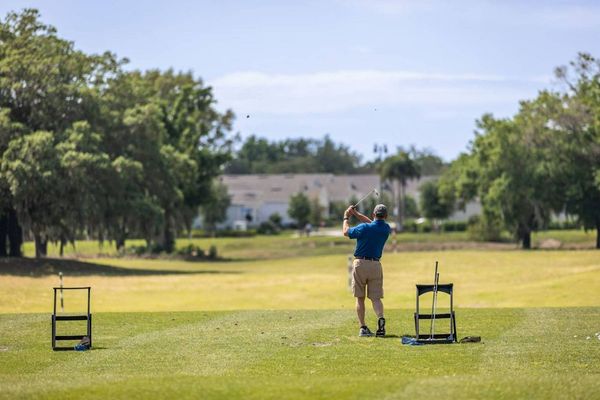 Hilton Vacation Club Mystic Dunes golfer.jpg