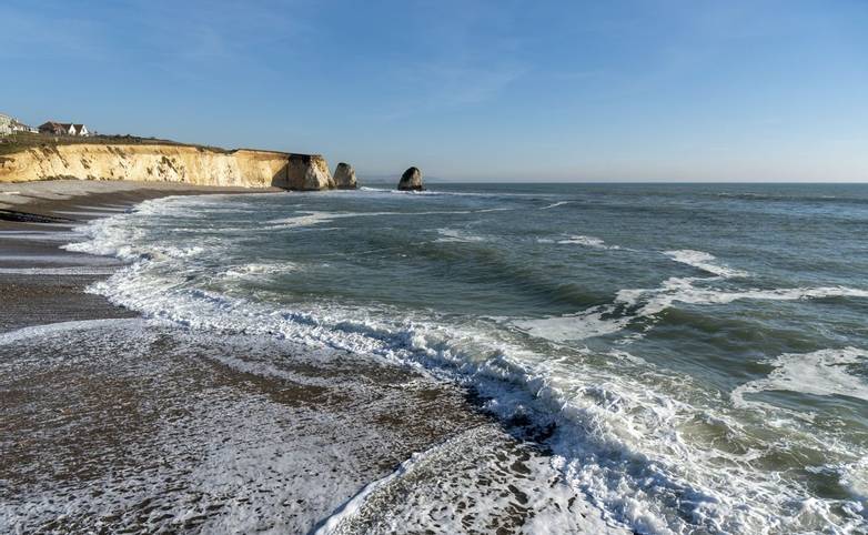 Freshwater Bay, Isle of Wight, England, UK. February 2019. Incoming tide on a winters afternoon on the Isle of Wight