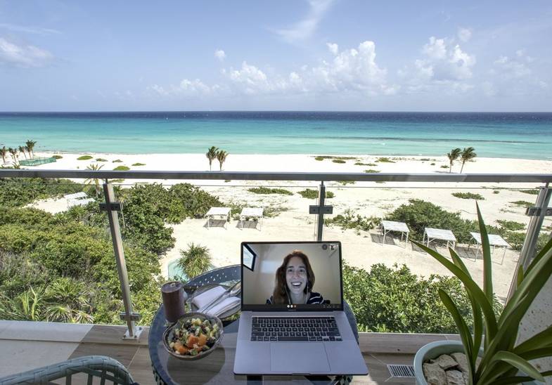 Palmaia-work-remote-oceanfront-balcony-computer.jpg