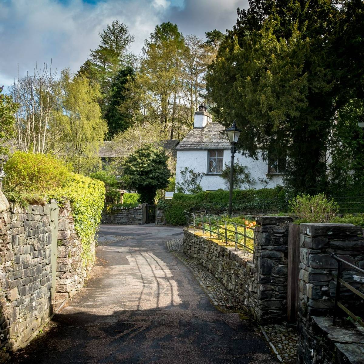 Traditional slate brick cottages in the rural English Lake District town of Grasmere known as the home of poet Willam Wordsw…