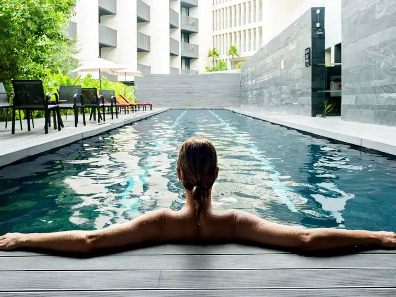 Grand Hyatt Playa del Carmen Resort woman in pool.jpg
