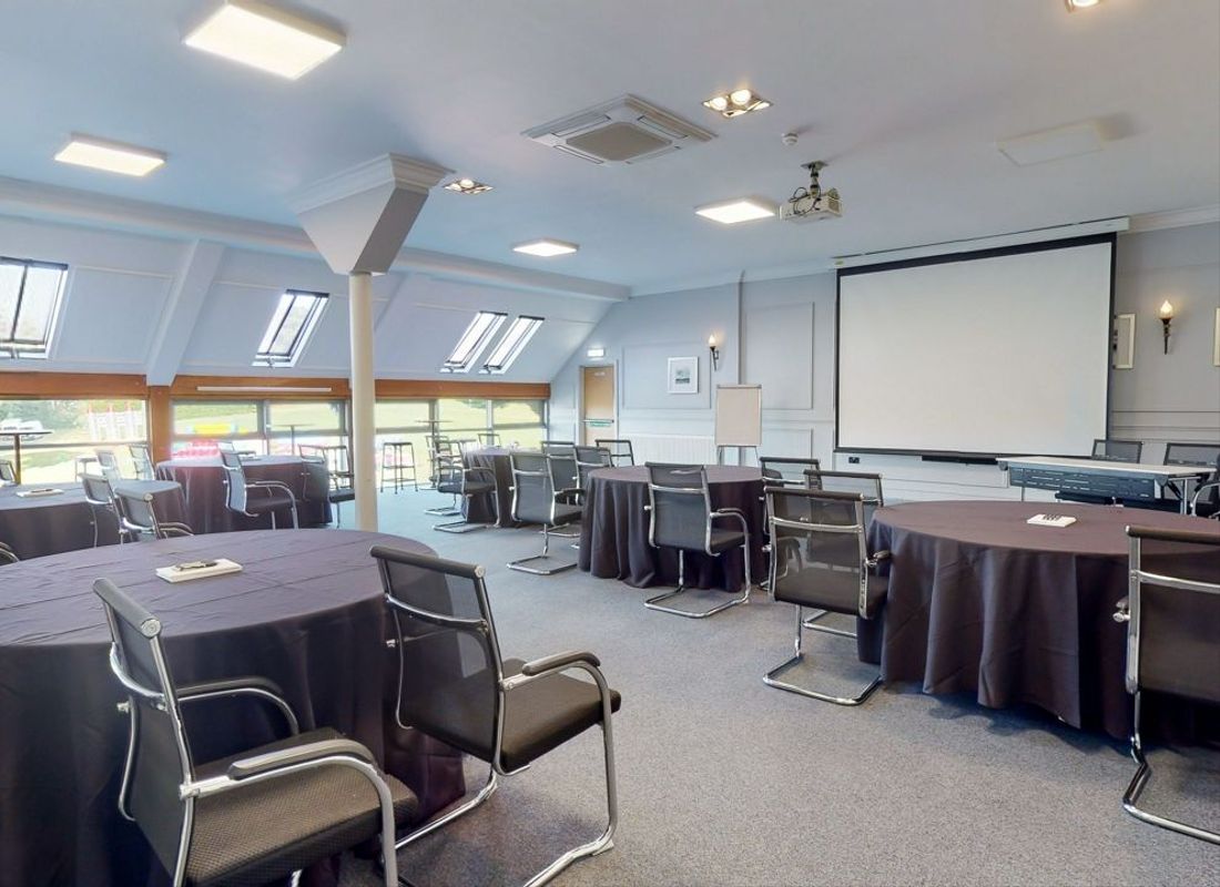 Large meeting room overlooking golf driving range