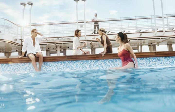 Guests enjoying the pool, Pool Deck, Silver Muse classic Guests enjoying the pool, Pool Deck, Silver Muse classic