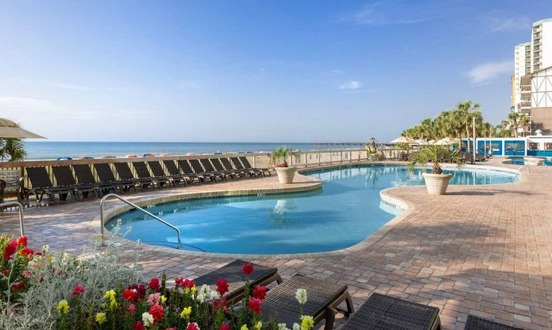 Caribbean Resort & Villas outdoor pool sundeck.jpg