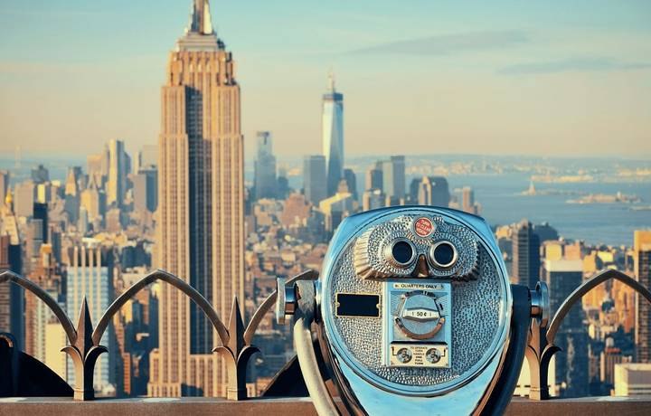 NEW YORK CITY, NY - JUL 11: Empire State Building and skyline on July 11, 2014 in New York City. It is a 102-story landmark … NEW YORK CITY, NY - JUL 11: Empire State Building and skyline on July 11, 2014 in New York City. It is a 102-story landmark …