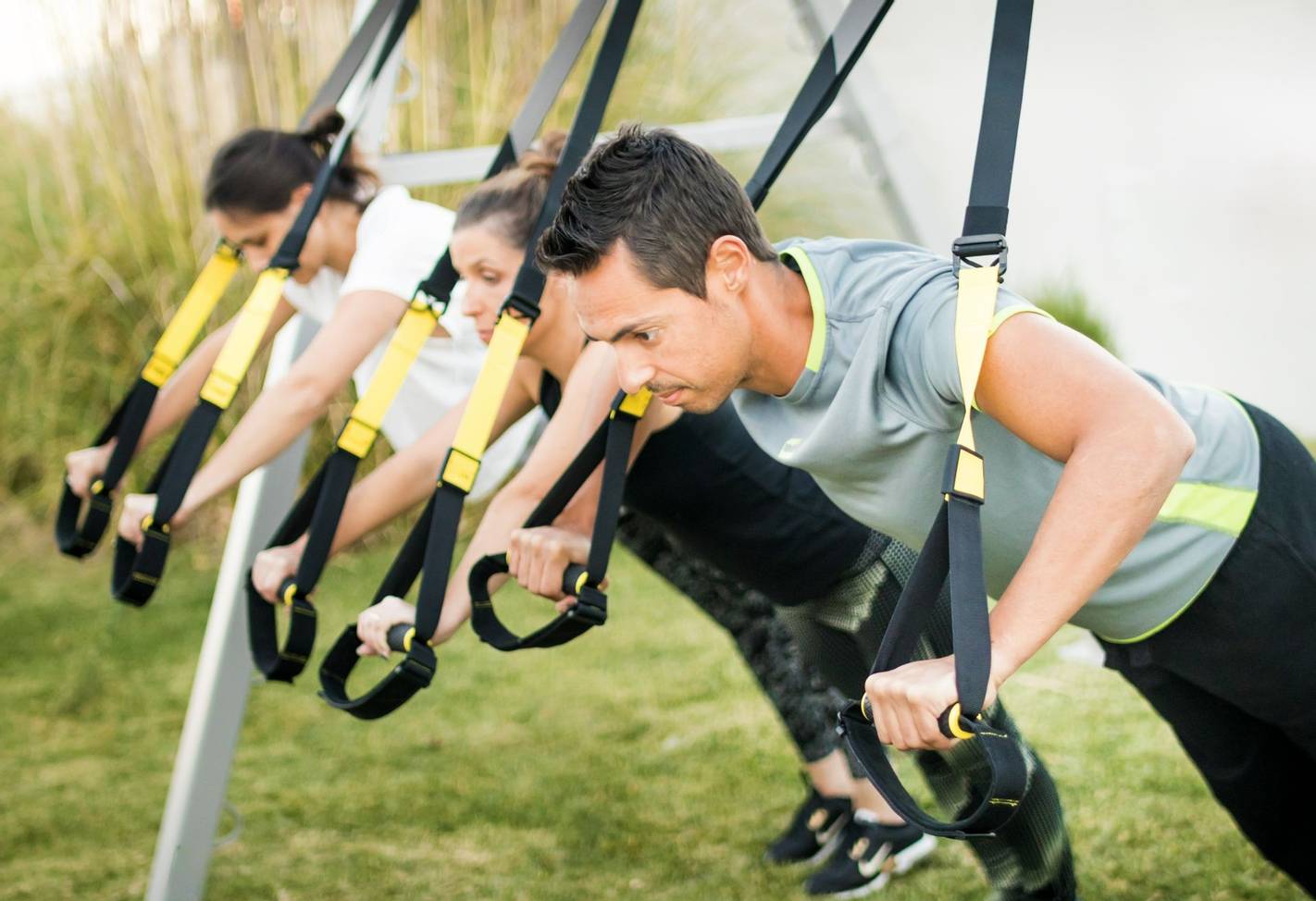 Group TRX training outdoors