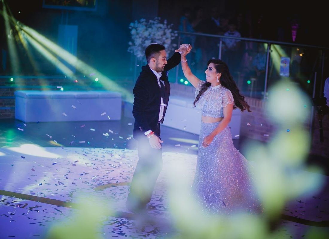 Wedding couple having first dance on dance space in the Grand Ballroom