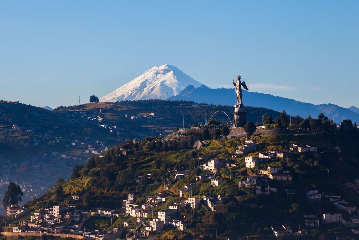 Quito with Cotopaxi in the background.webp