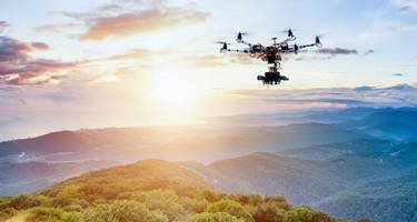 Drone taking landscape photographs