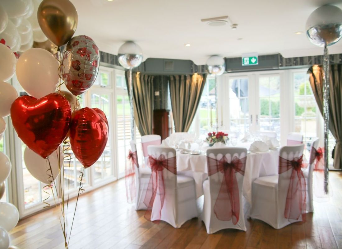 Anniversary dinner party in the Hampshire Suite with heart shaped balloons