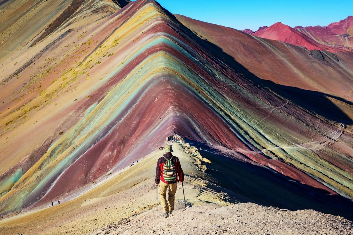 Hiking scene in Vinicunca, Cusco Region, Peru. Montana de Siete Colores,  Rainbow Mountain.