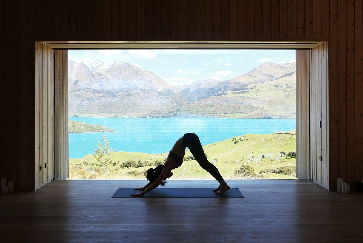 Woman practising yoga at Aro Ha in New Zealand