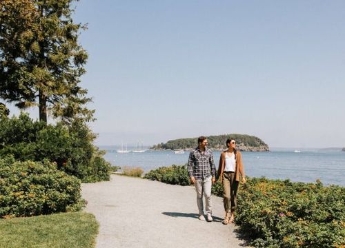 West Street Bar_Harbor_Couple_WalkingonPathbyOcean-768x512.jpg