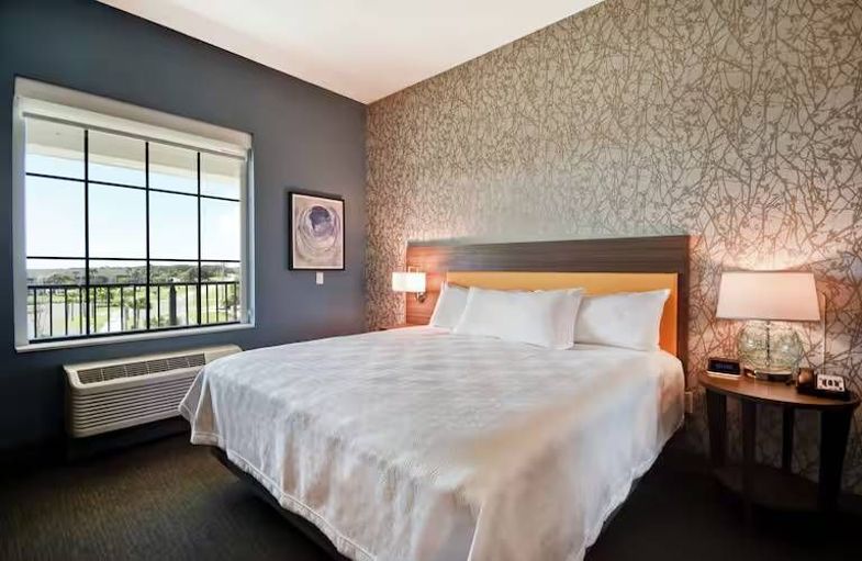 Home2 Suites Jekyll Island king bed.jpg