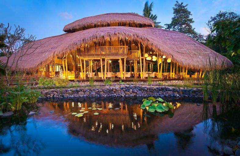 Sakti Dining Room at Fivelements Healing Center. The soaring roofline, sculpted from bamboo and thatch, resembles a banana l…