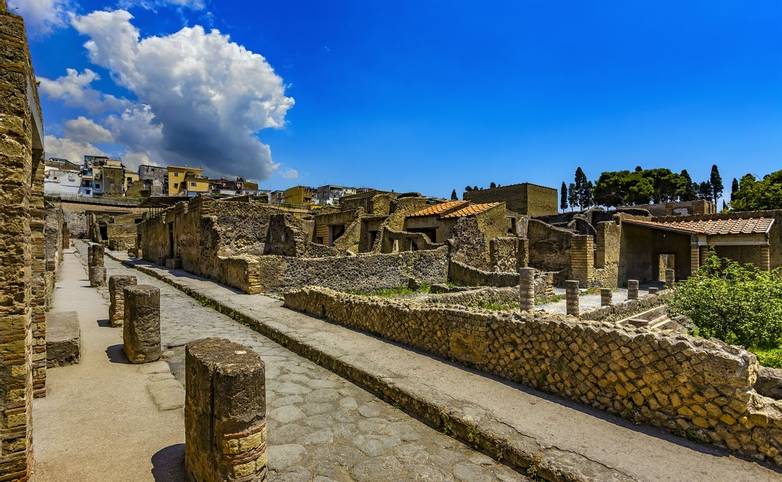 Italy. Ruins of Herculaneum (UNESCO World Heritage Site) - Cardo III Inferiore (lower Cardo street) and remains of ancient h…
