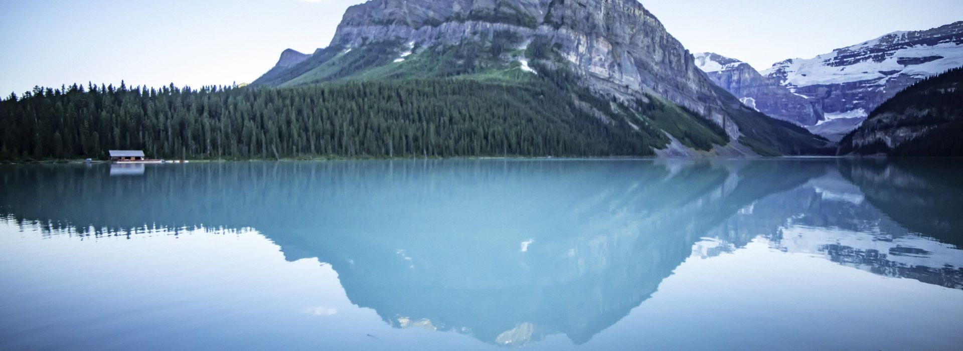 Intrepid-Travel-Canada-Banff-Lake-Louise-hut-reflection.jpg