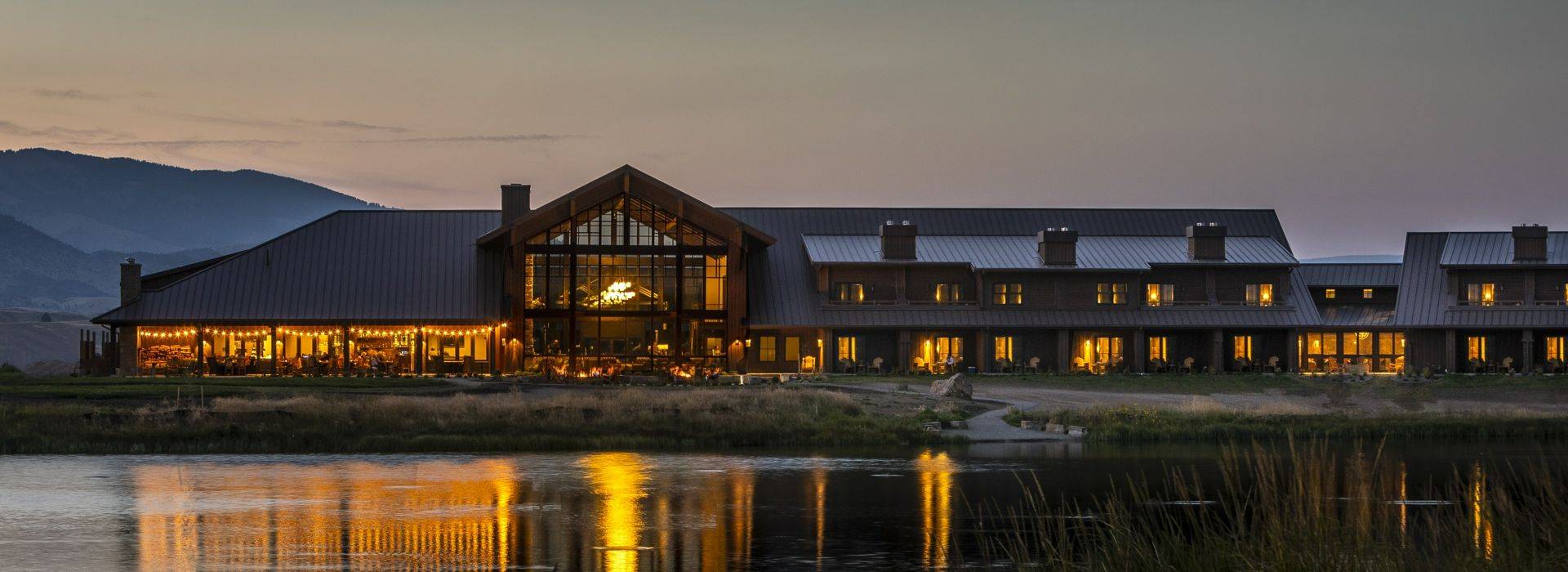 Sage-Lodge-Exterior Overlooking Pond at Dusk.jpg