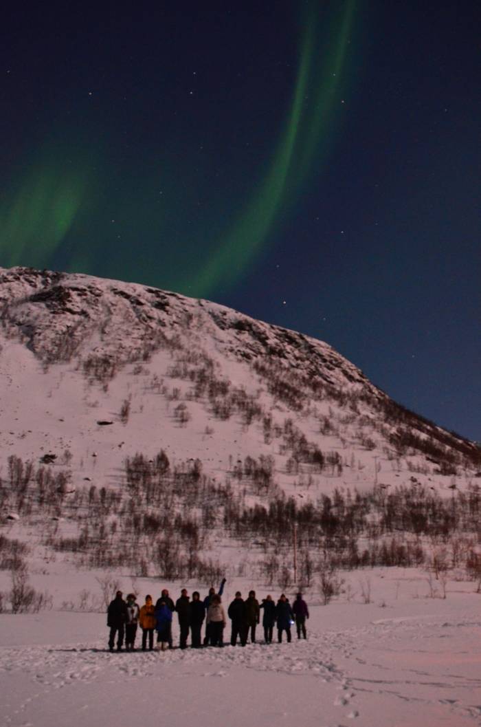 Group under Northern Lights by D Phillips
