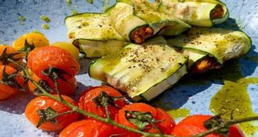 Roasted tomatoes and courgette ravioli drizzled with olive oil