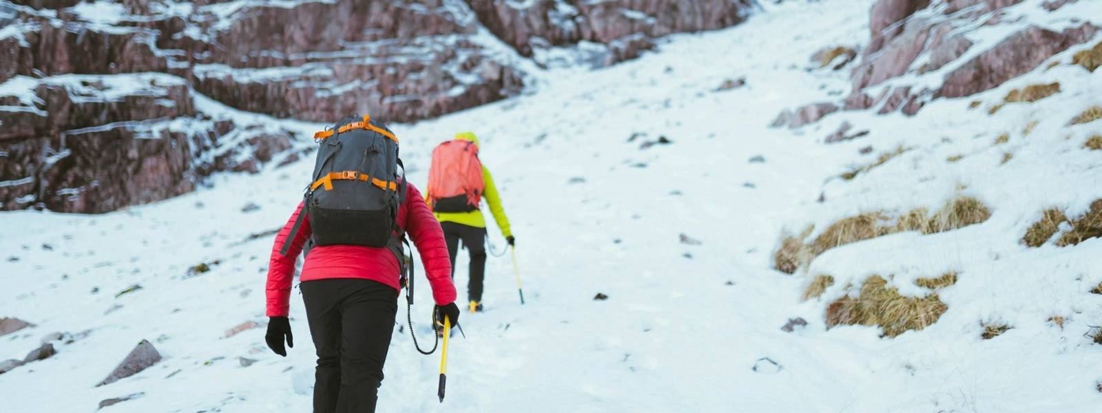 Mountaineers climbing the snowy mountain