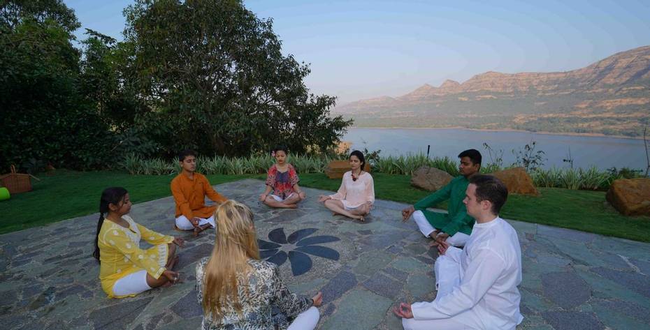 Group meditation cirlce at Atmantan Wellness Resort in India